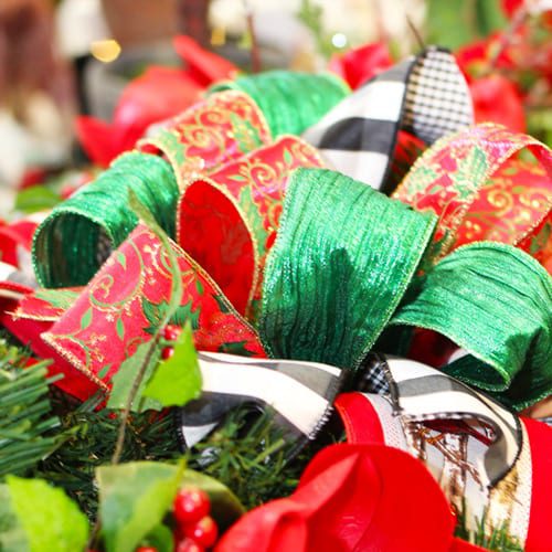 red and green bow on garland